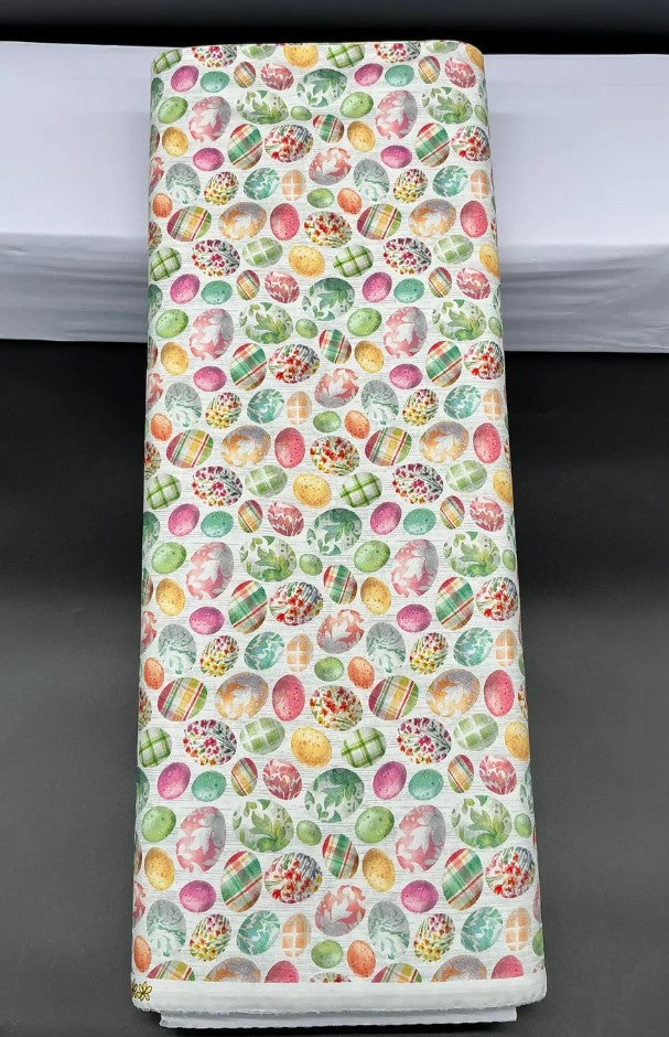 Colorful Easter egg patterned fabric on a white background