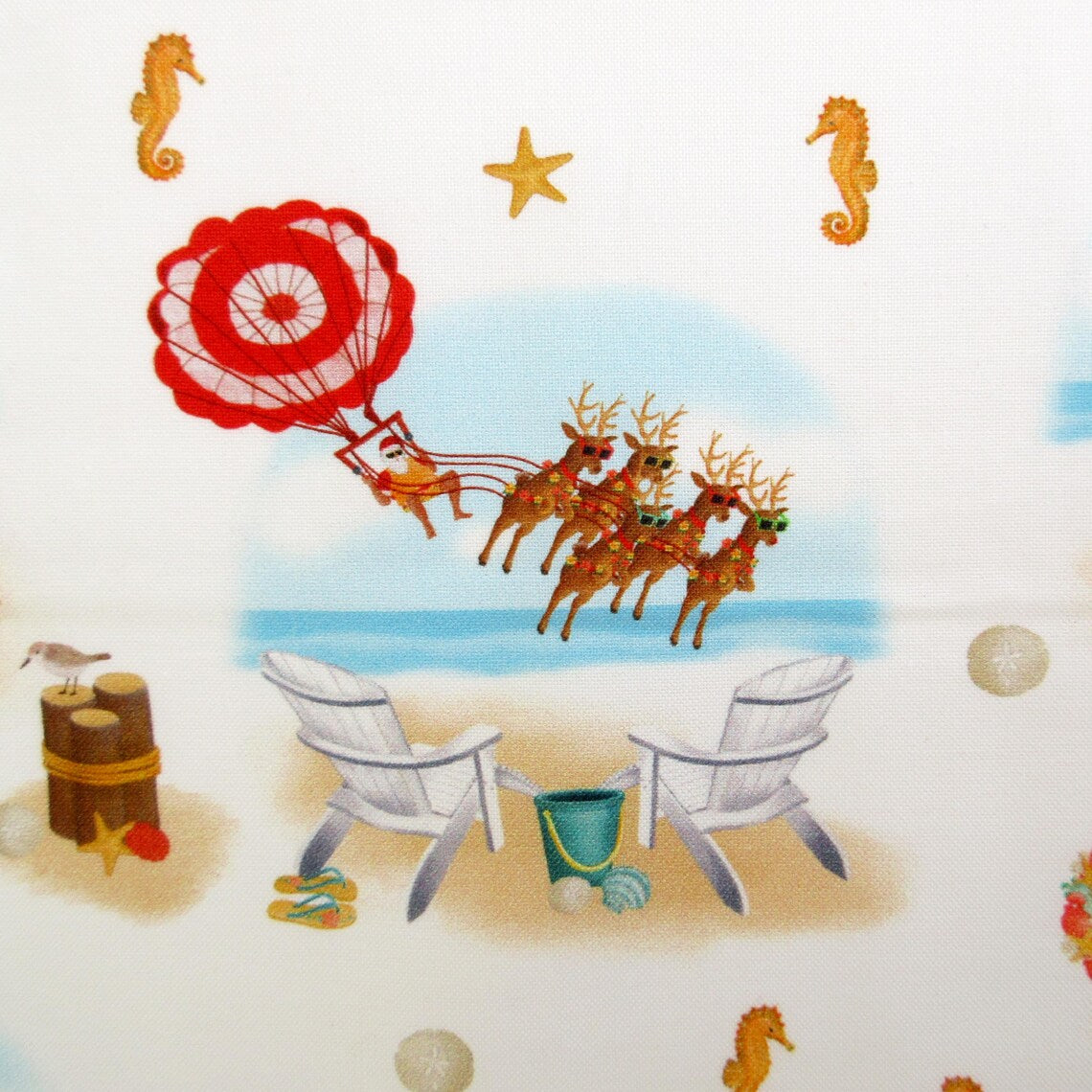 Christmas Santa at the Beach on Whtie 100% Cotton Price per Yard