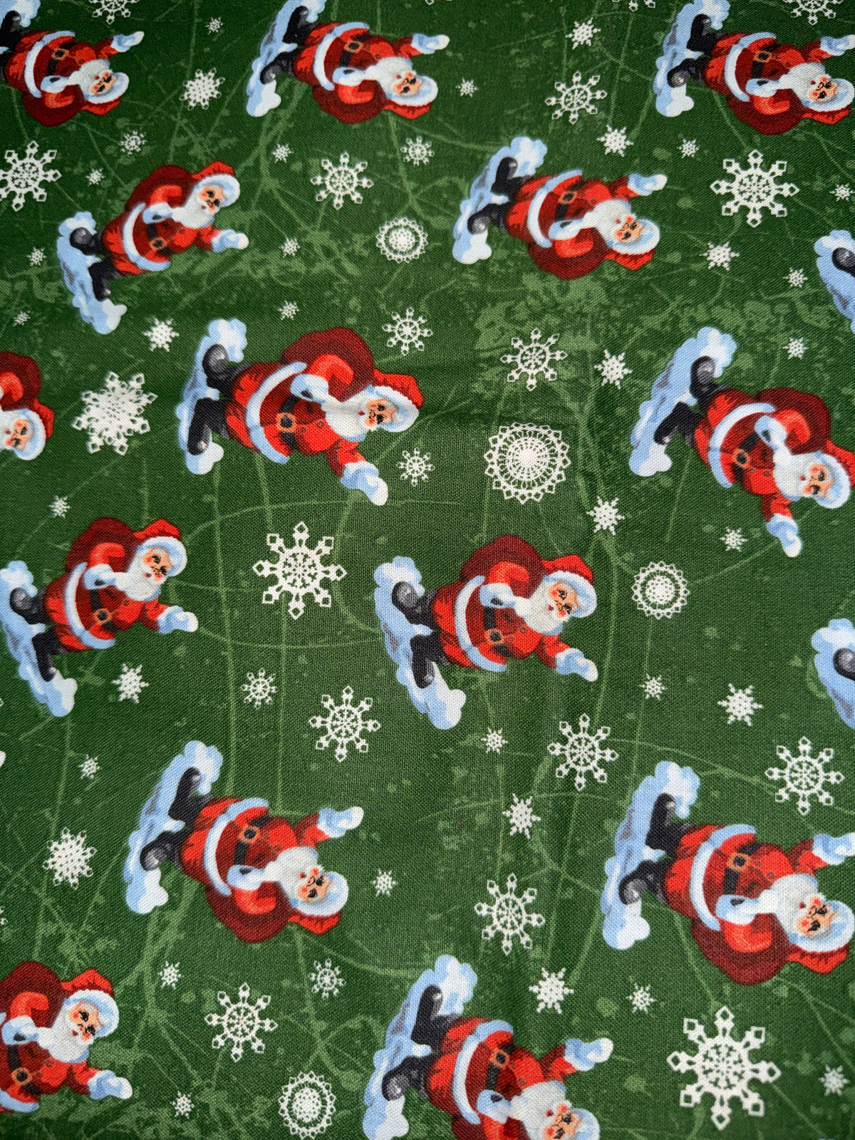 Christmas Santa on Clouds Snowflakes on Green 100% Cotton Fabric