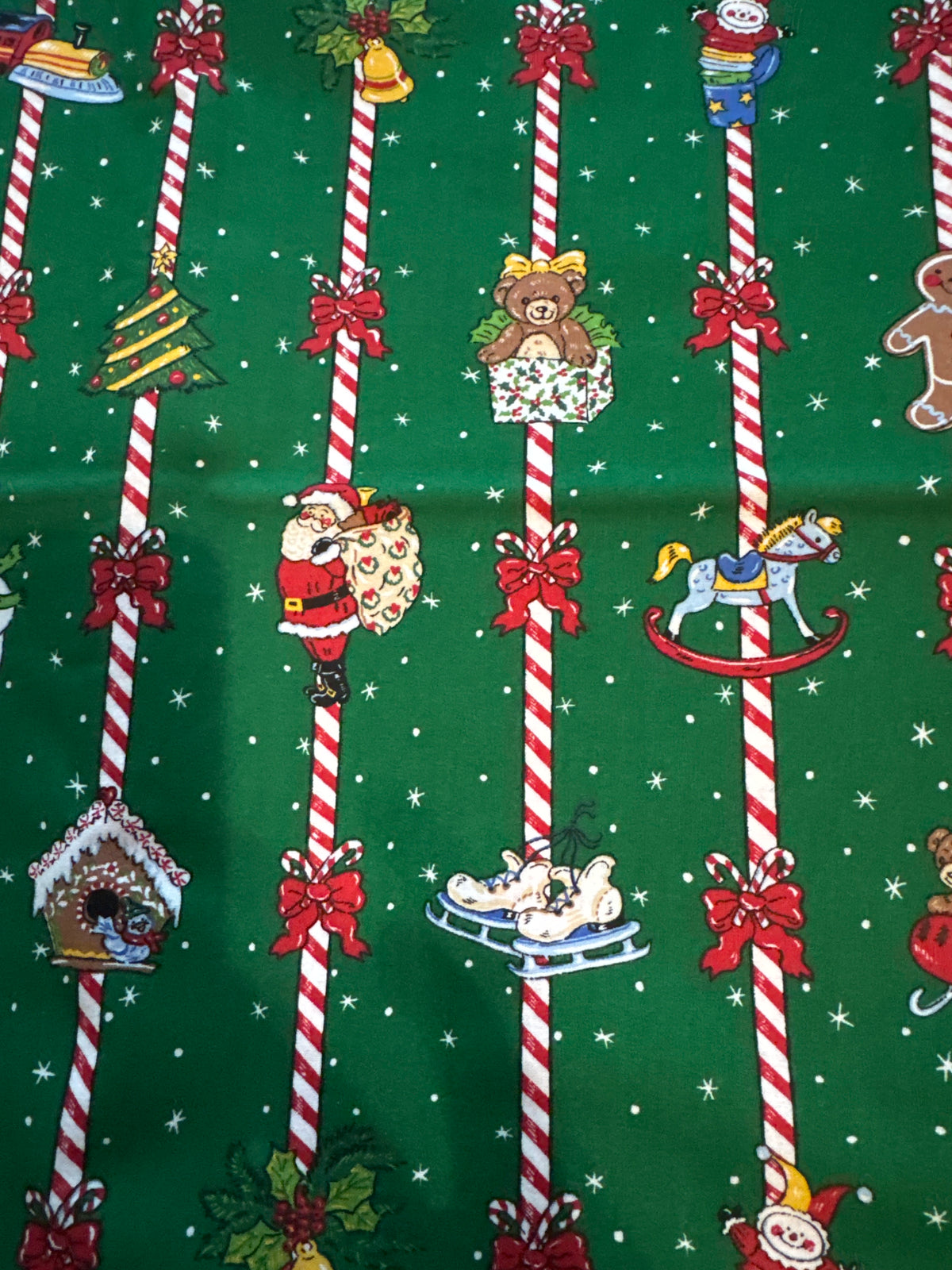 Christmas Vintage Toys and Candy Canes Stripes on Green 100% Lightweight Cotton Price per Yard