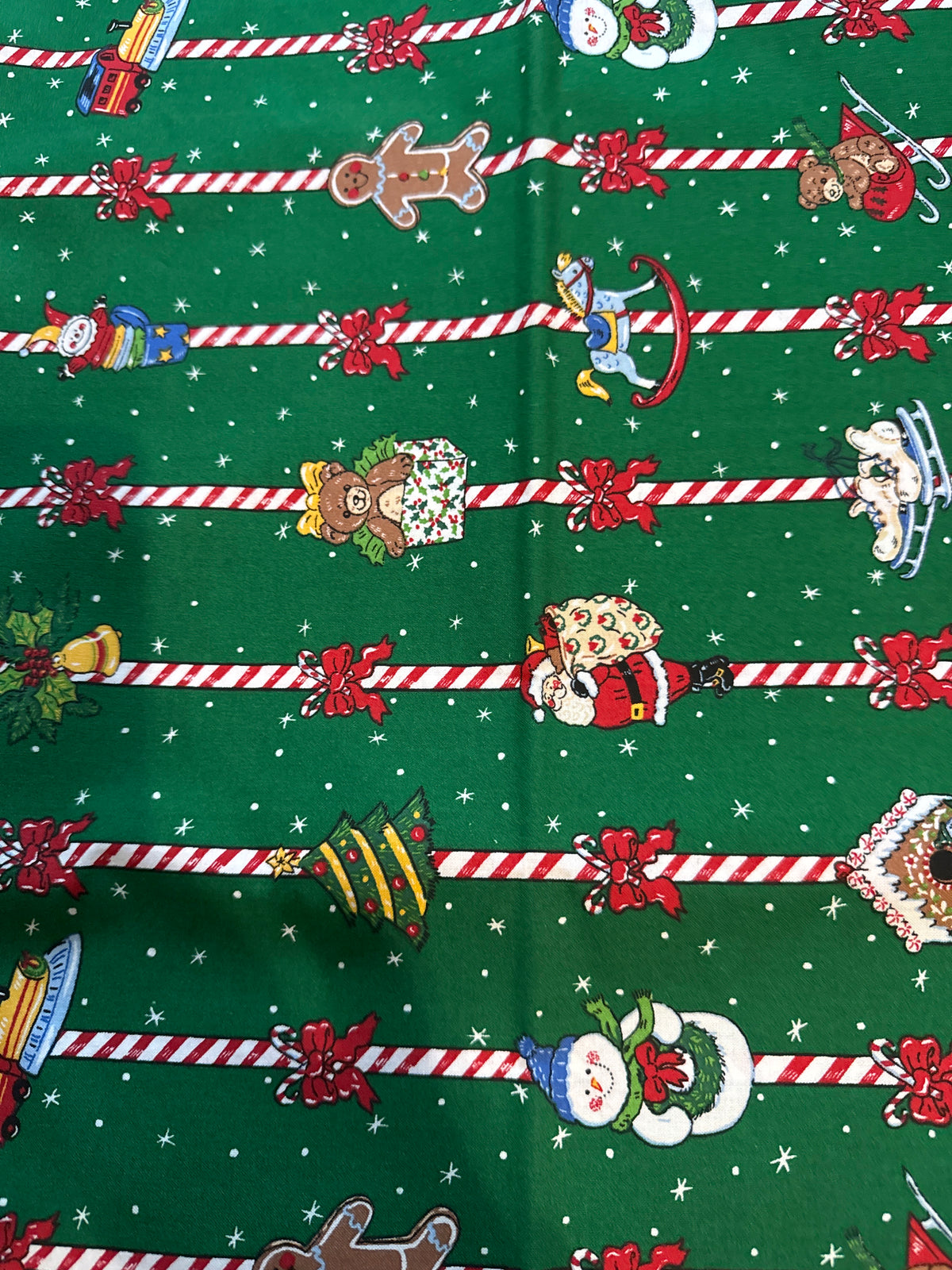 Christmas Vintage Toys and Candy Canes Stripes on Green 100% Lightweight Cotton Price per Yard
