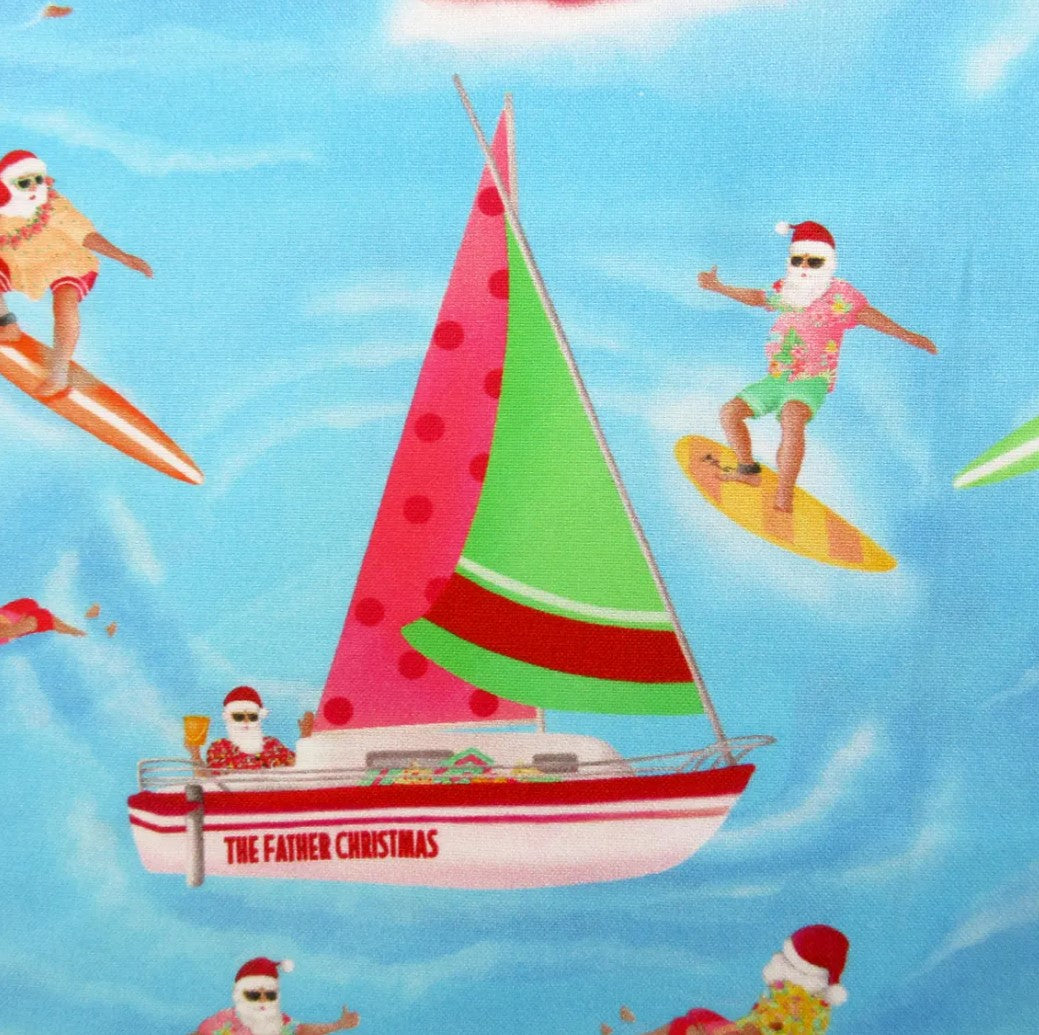Christmas Santa at Sea on Blue 100% Cotton Price per Yard