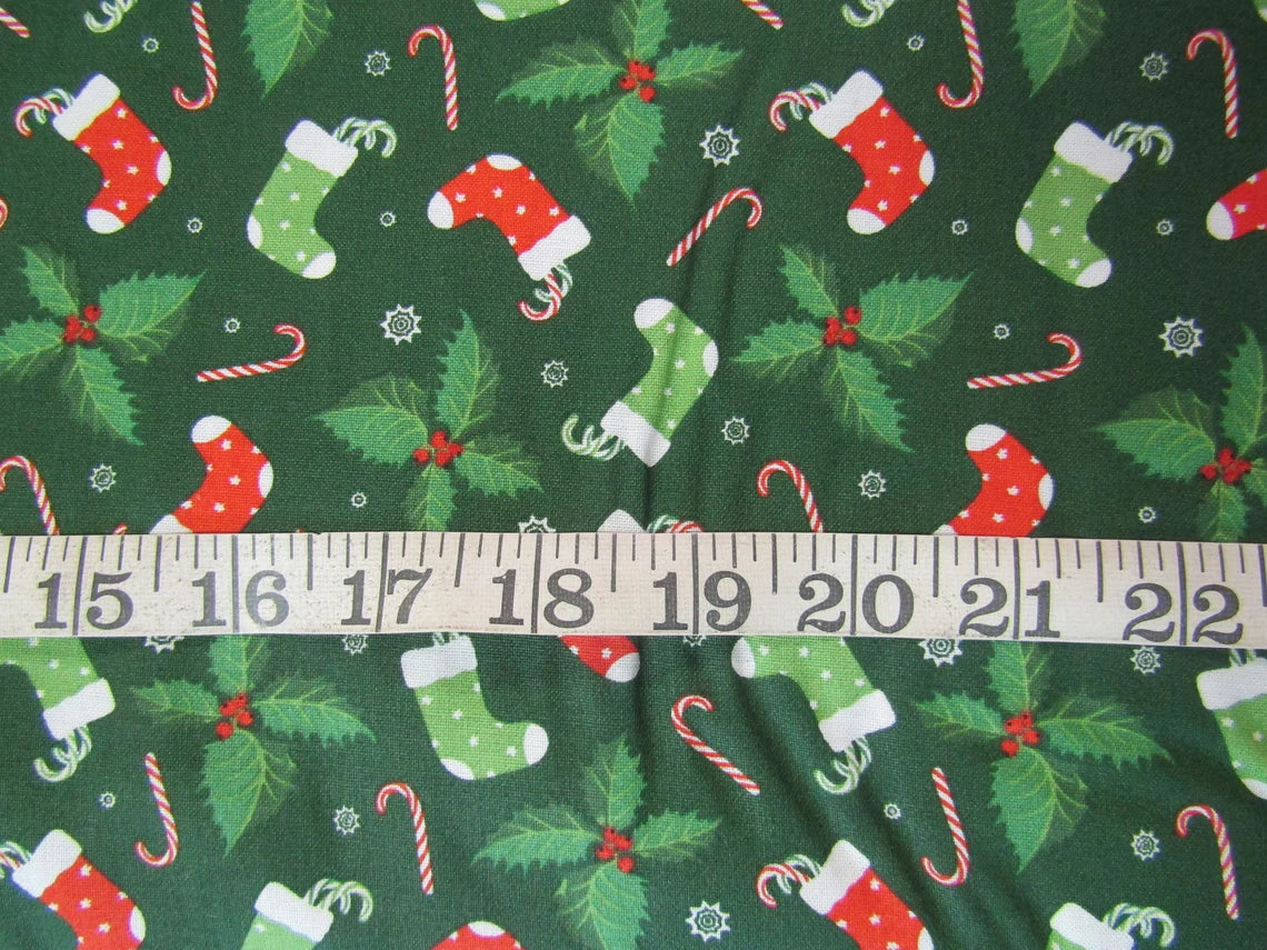 Christmas Red and Green Stockings and Candy Canes on Green  100% Cotton Fabric By the Yard