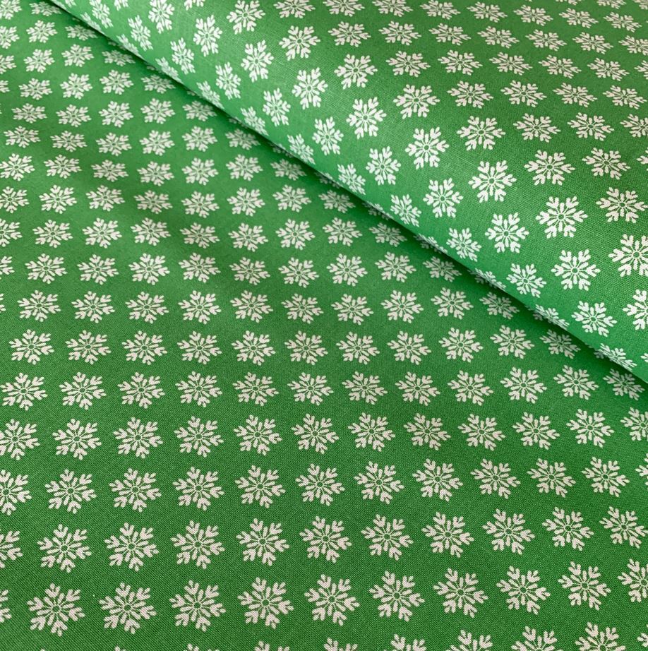 45 x 36 Christmas Snowflakes on Green 100% Cotton Fabric