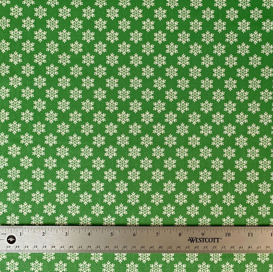 45 x 36 Christmas Snowflakes on Green 100% Cotton Fabric